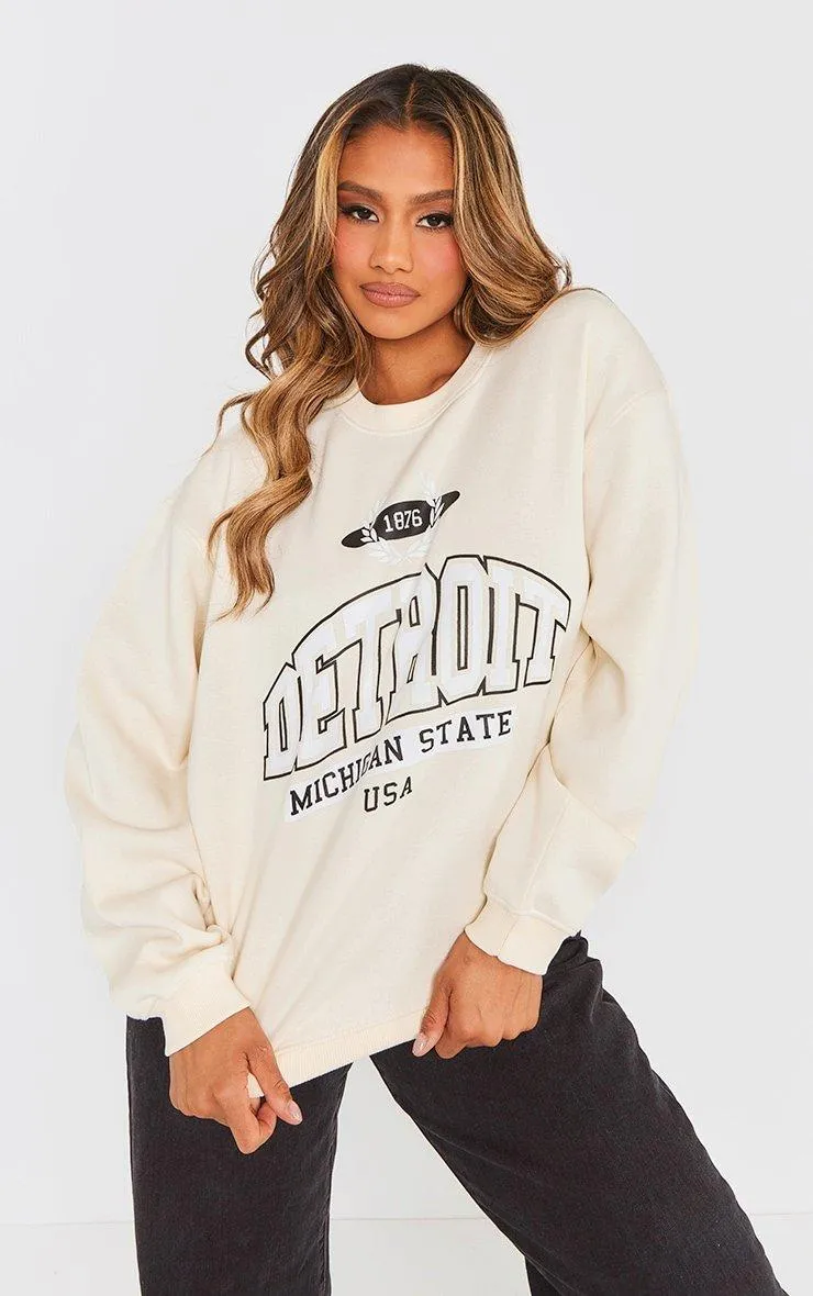 Hoodies & Sweatshirts | Cream Detroit Print Sweatshirt | PrettyLittleThing