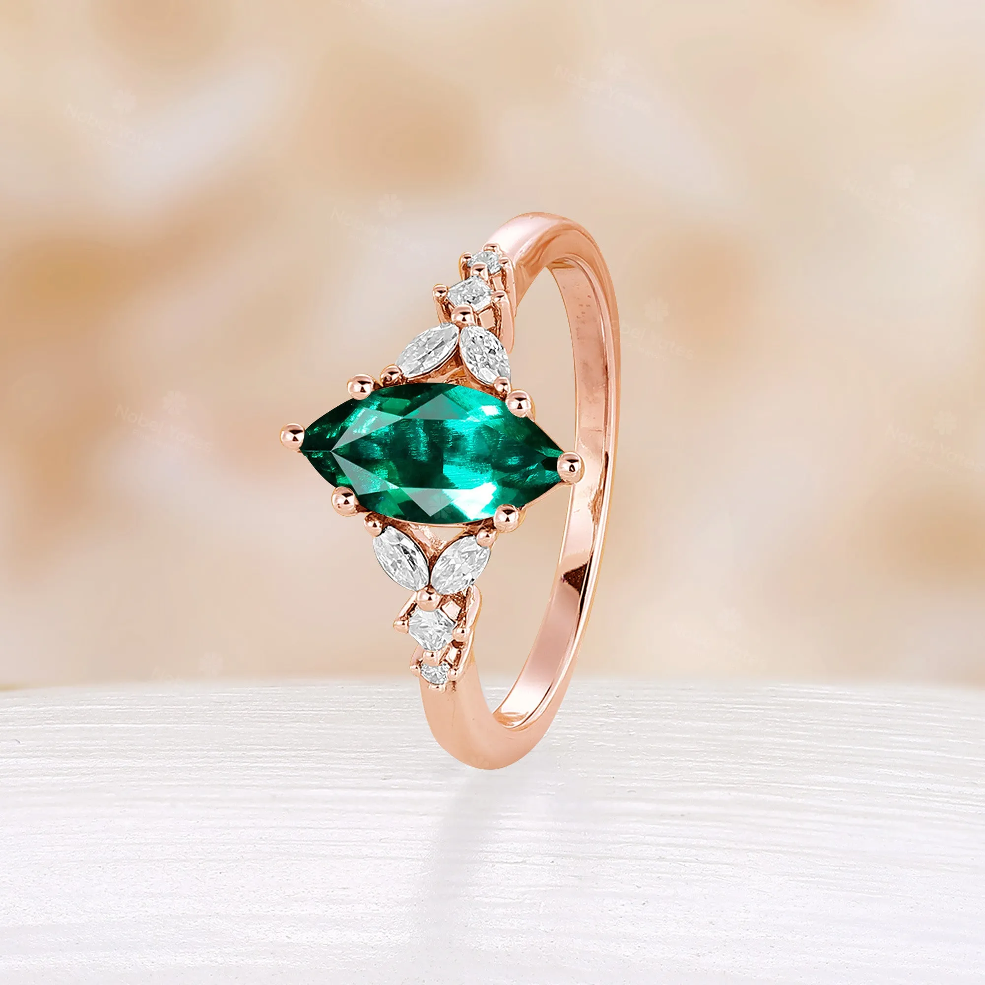 Marquise Shape Lab Emerald Side Stone Cluster Engagement Ring Rose Gold